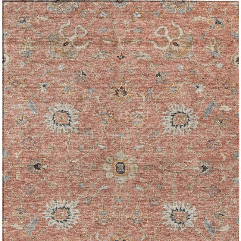 Pink floral area rug featuring gray and beige medallions and ornamental motifs