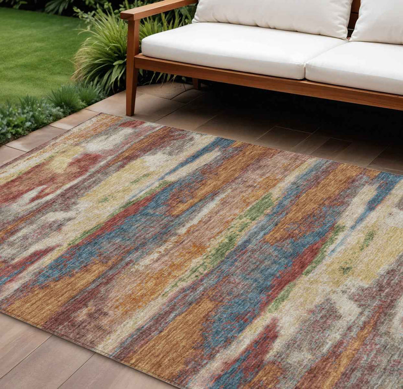 10' X 14' Orange Green And Gold Abstract Washable Indoor Outdoor Area Rug