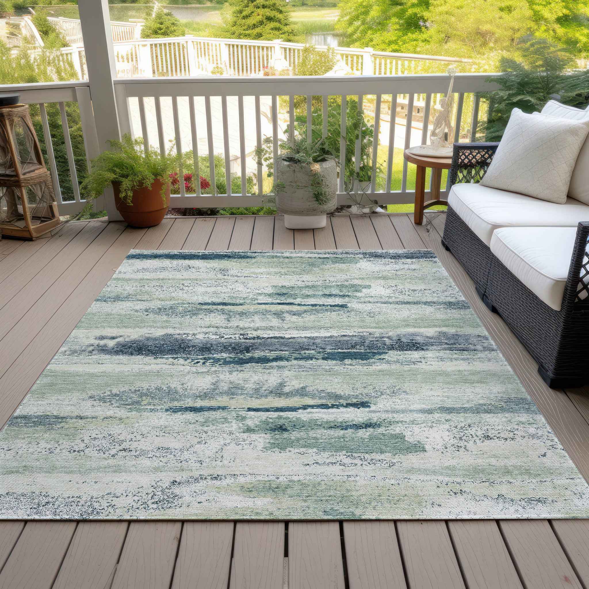 9' X 12' Mint Green Ivory And Denim Blue Abstract Washable Indoor Outdoor Area Rug
