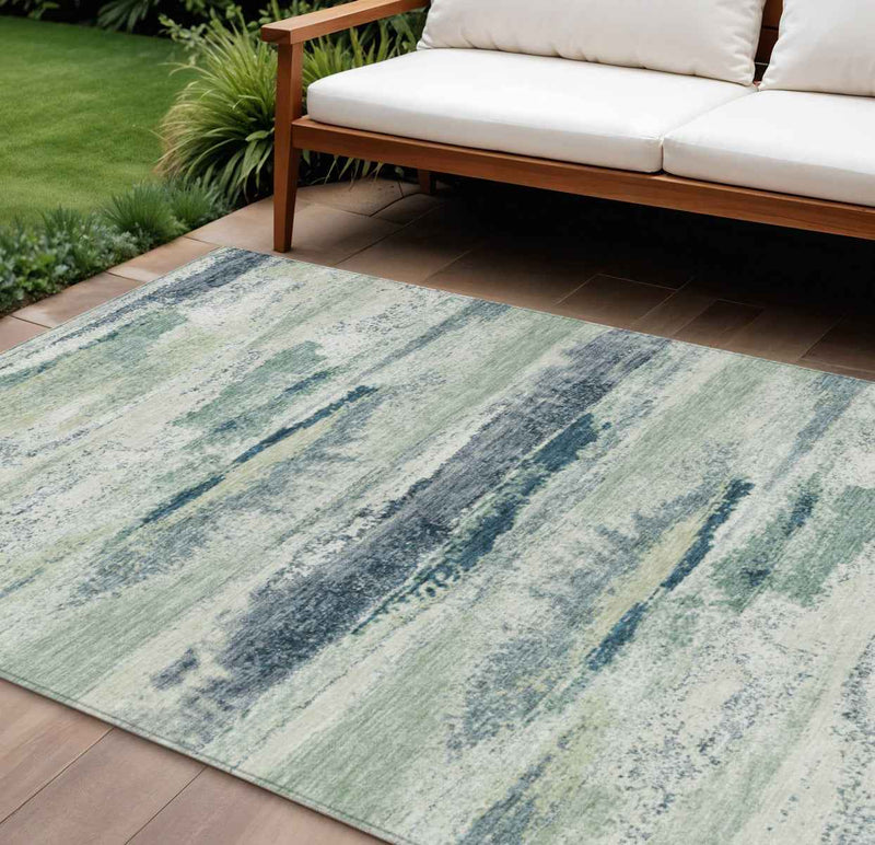 8' X 10' Mint Green Ivory And Denim Blue Abstract Washable Indoor Outdoor Area Rug