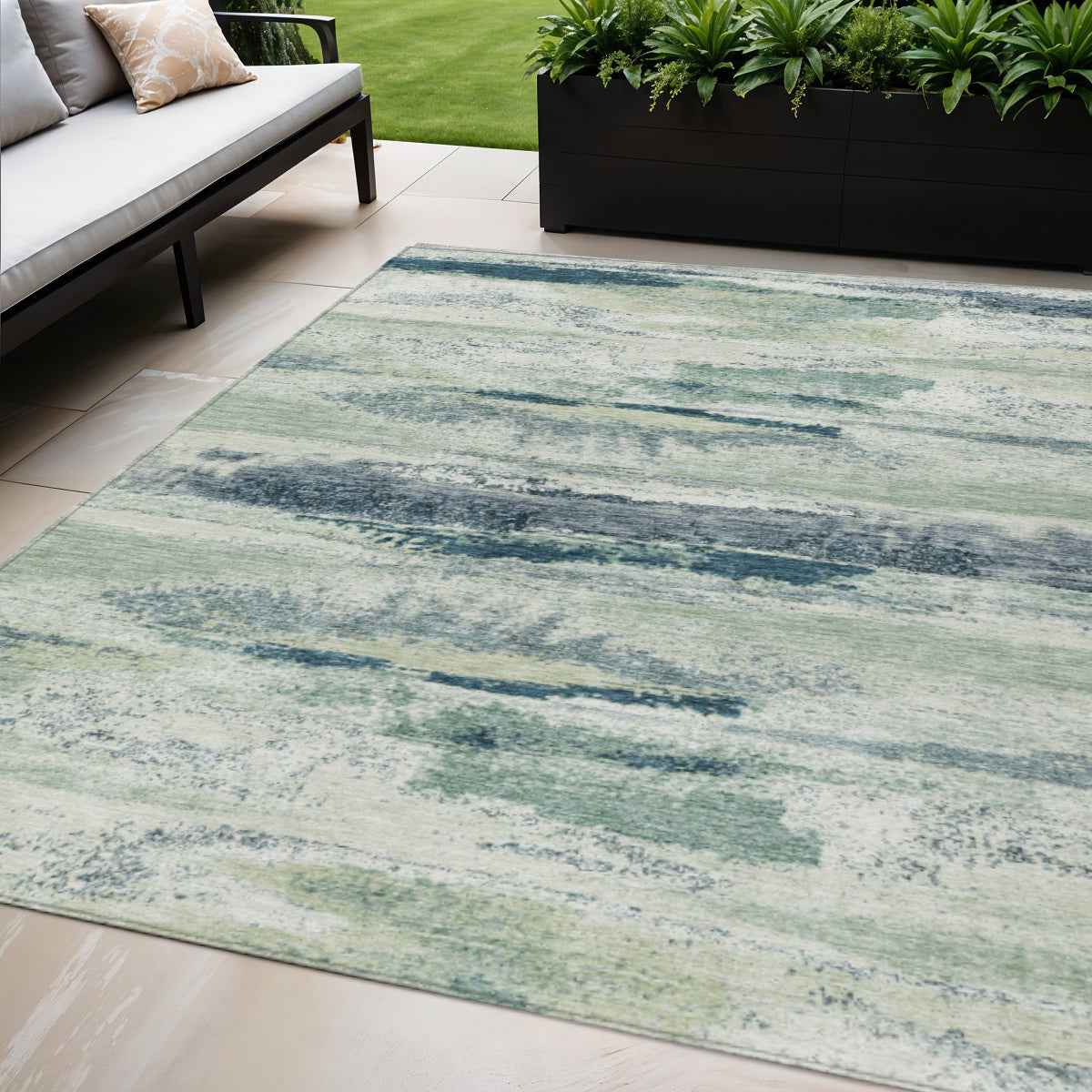 5' X 8' Mint Green Ivory And Denim Blue Abstract Washable Indoor Outdoor Area Rug