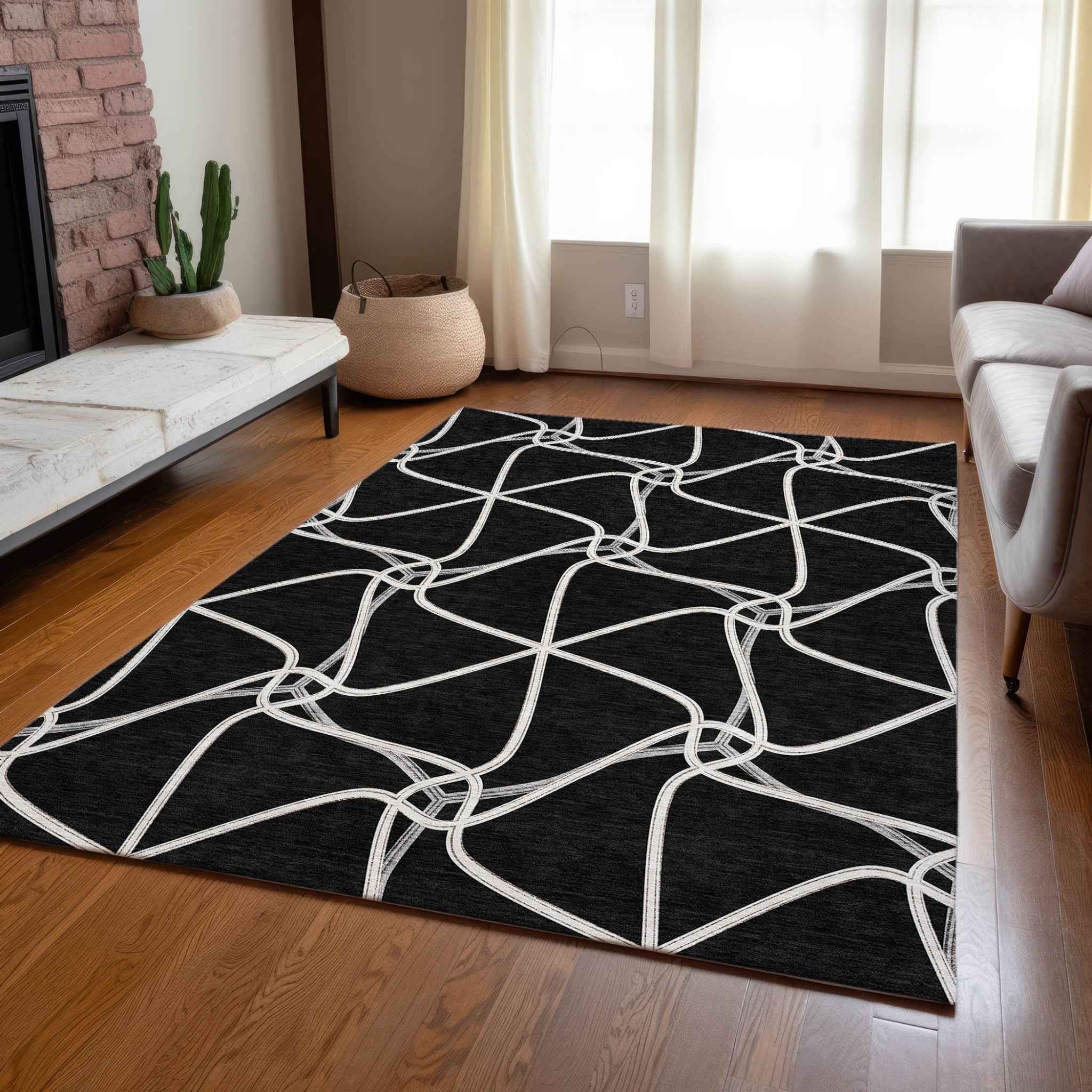 3' X 5' Black And Ivory Geometric Washable Indoor Outdoor Area Rug