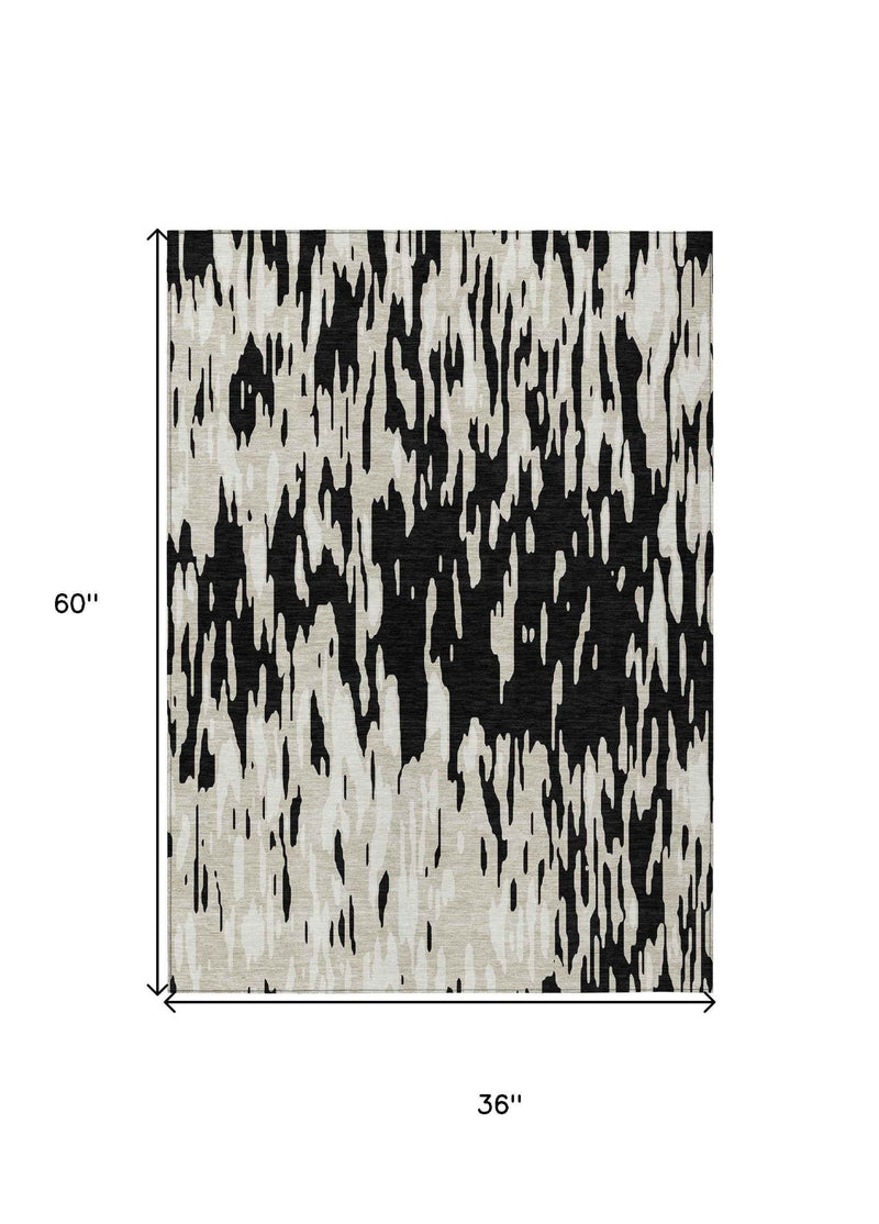 3' X 5' Black And Ivory Abstract Washable Indoor Outdoor Area Rug