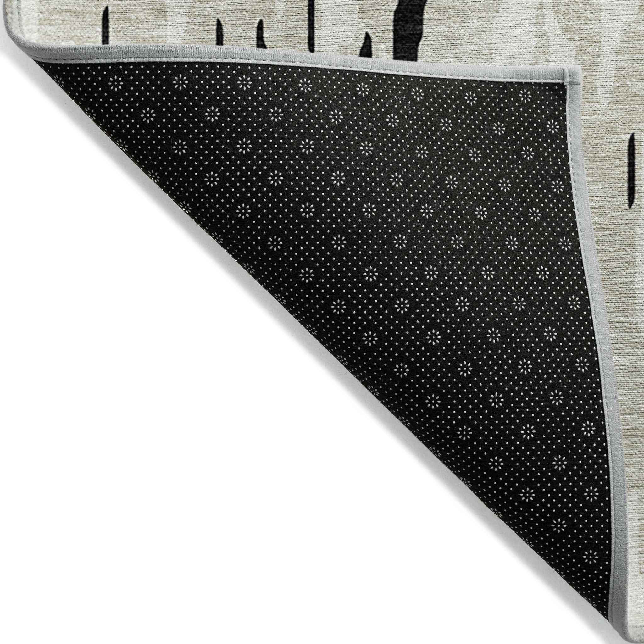 3' X 5' Black And Ivory Abstract Washable Indoor Outdoor Area Rug