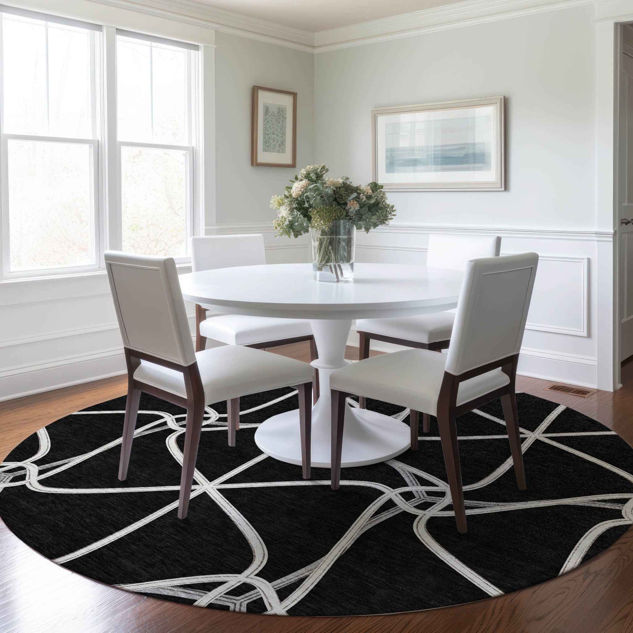 8' Black And Ivory Round Geometric Washable Indoor Outdoor Area Rug