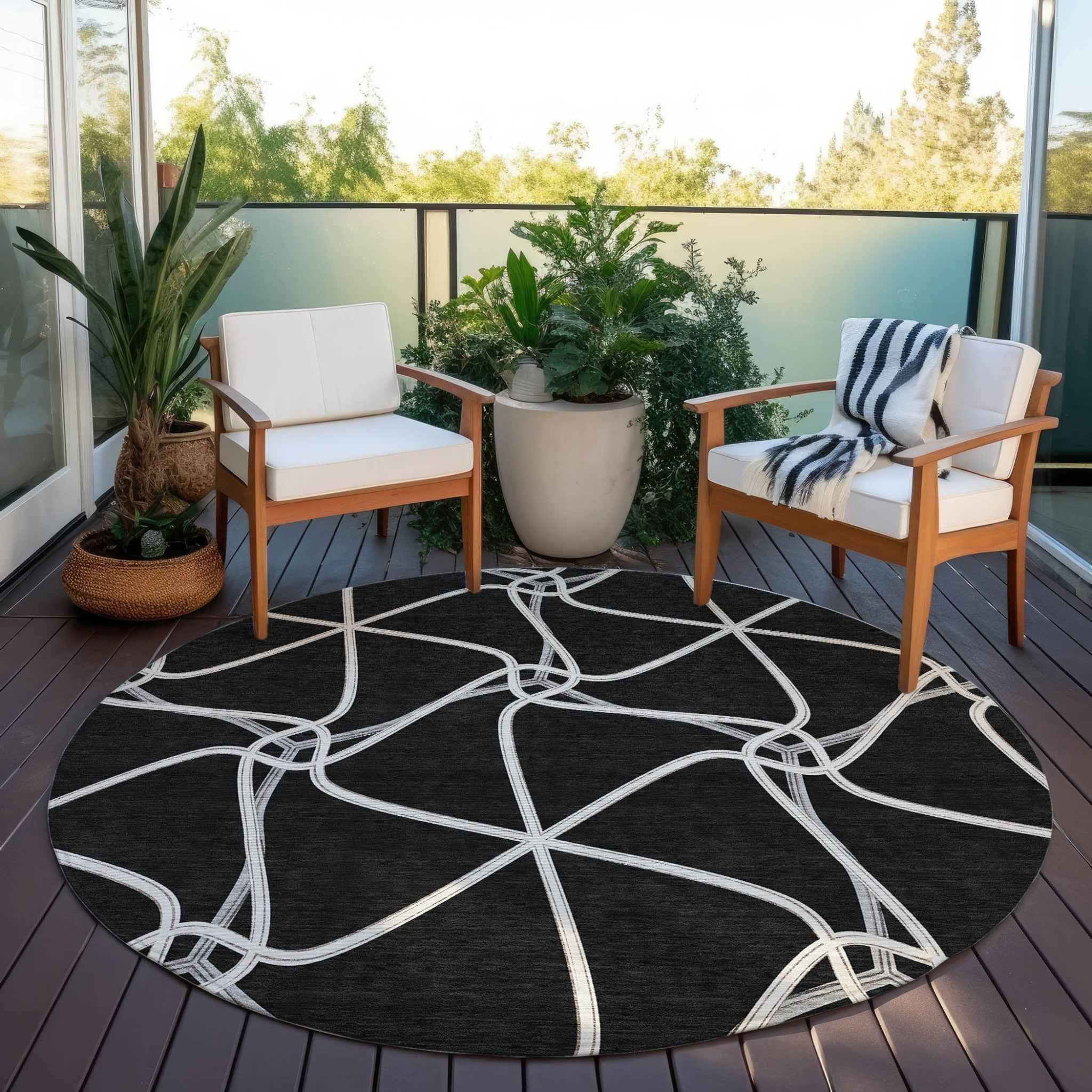 8' Black And Ivory Round Geometric Washable Indoor Outdoor Area Rug