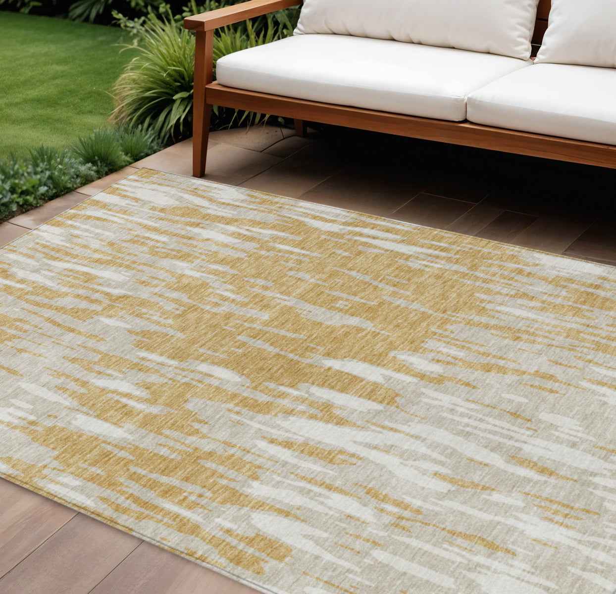 8' X 10' Gold And Ivory Abstract Washable Indoor Outdoor Area Rug