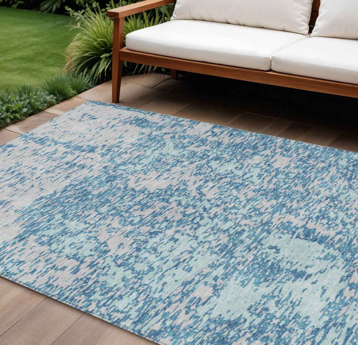 10' X 14' Teal Blue And Ivory Abstract Washable Indoor Outdoor Area Rug