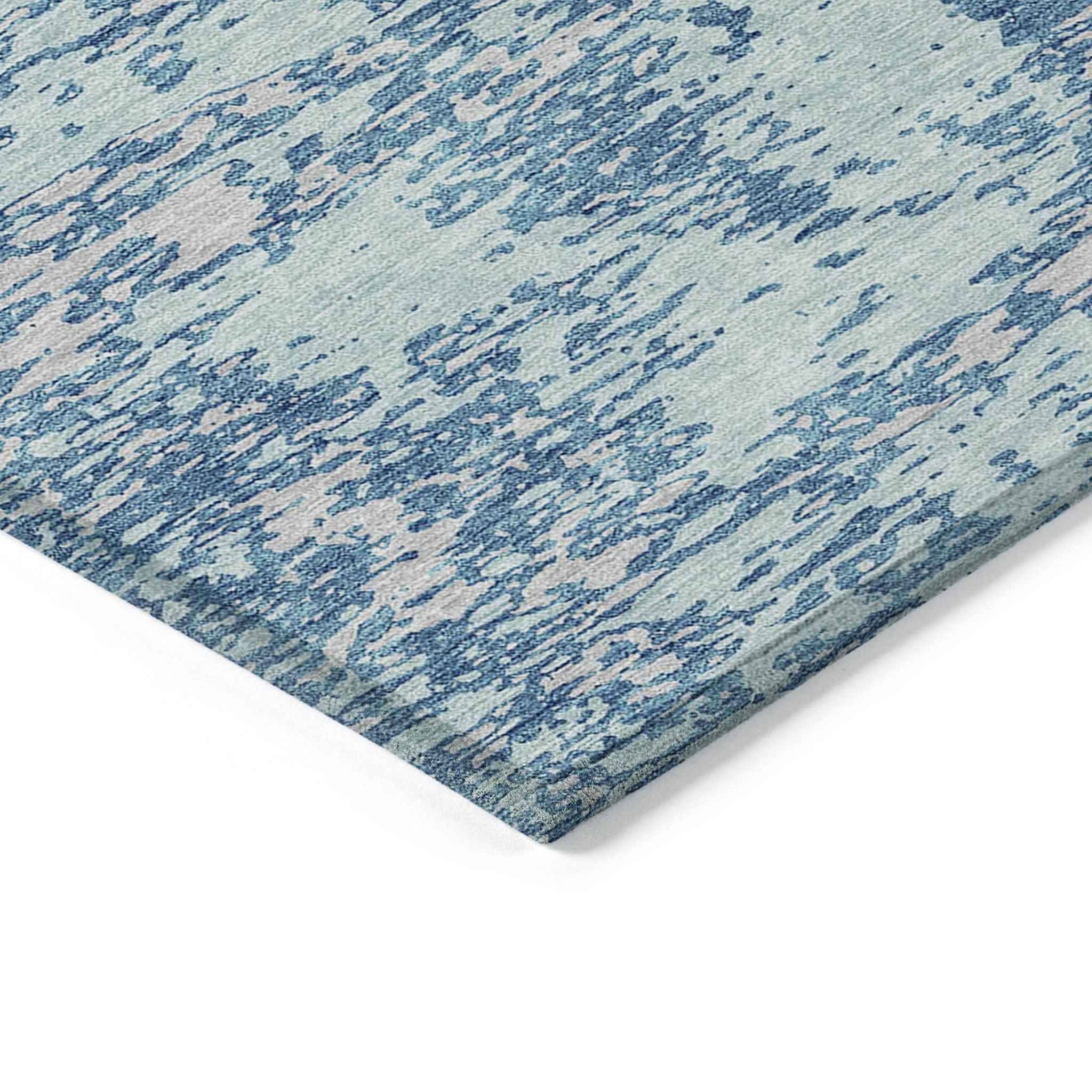 10' X 14' Teal Blue And Ivory Abstract Washable Indoor Outdoor Area Rug