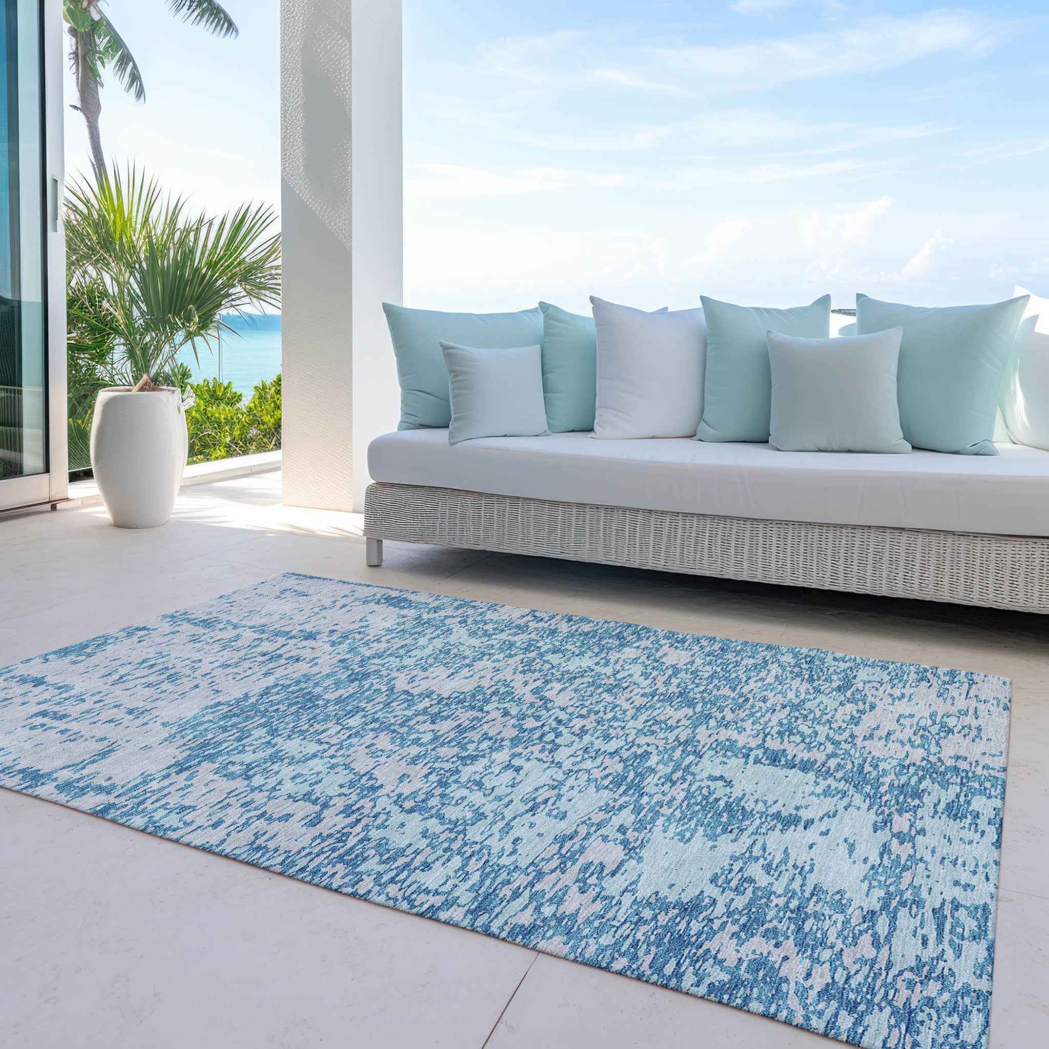 5' X 8' Teal Blue And Ivory Abstract Washable Indoor Outdoor Area Rug