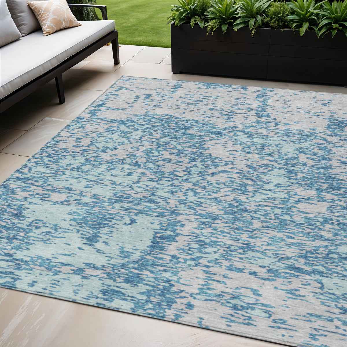 5' X 8' Teal Blue And Ivory Abstract Washable Indoor Outdoor Area Rug