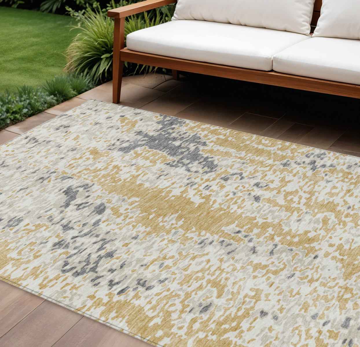 8' X 10' Gold And Ivory Abstract Washable Indoor Outdoor Area Rug