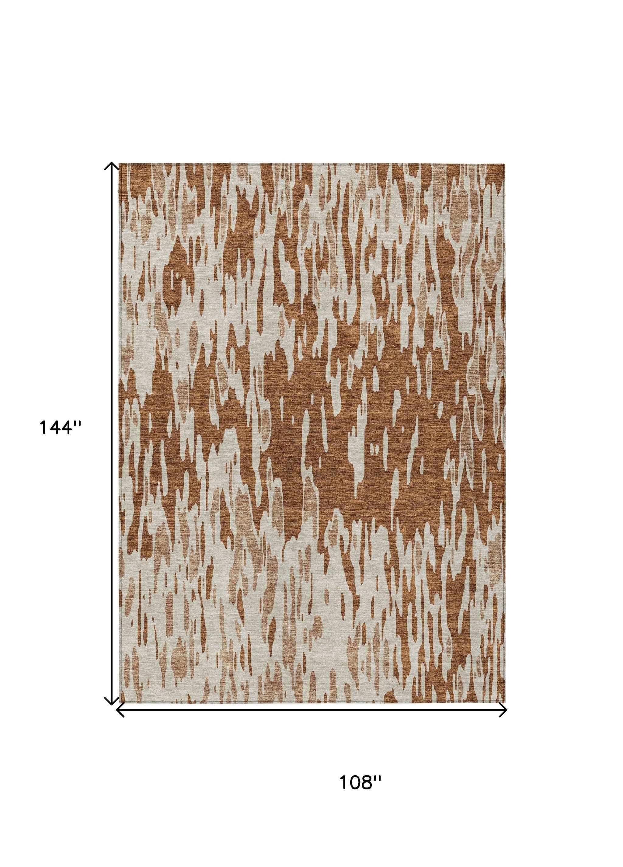 9' X 12' Orange And Ivory Abstract Washable Indoor Outdoor Area Rug