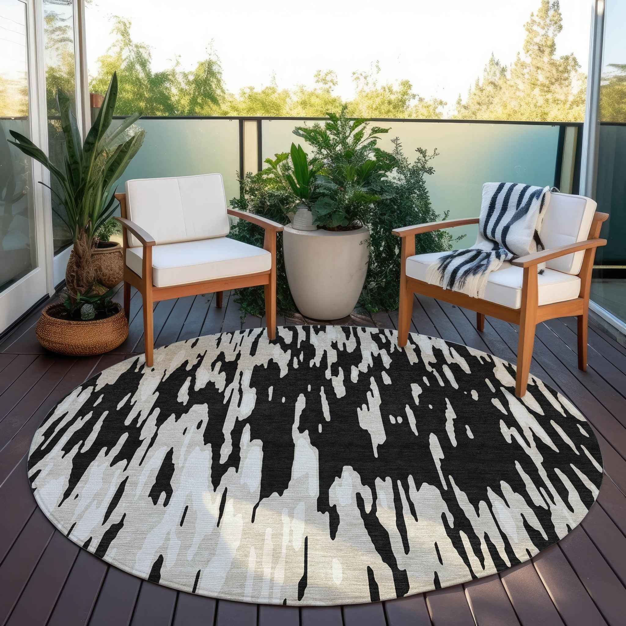 8' Black And Ivory Round Abstract Washable Indoor Outdoor Area Rug