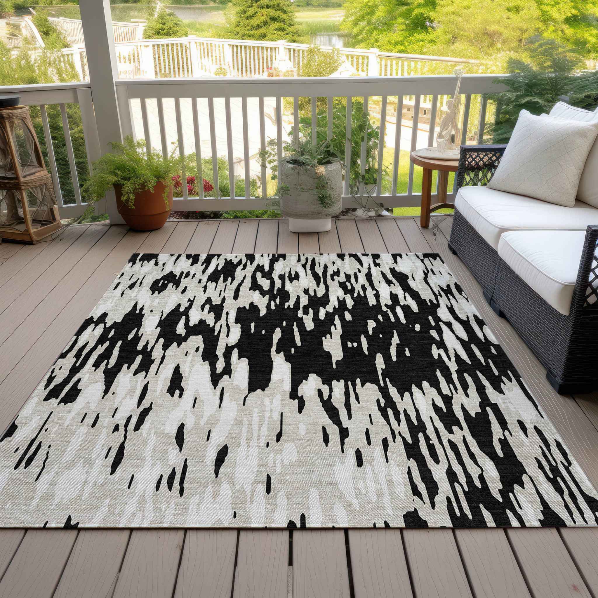10' X 14' Black And Ivory Abstract Washable Indoor Outdoor Area Rug