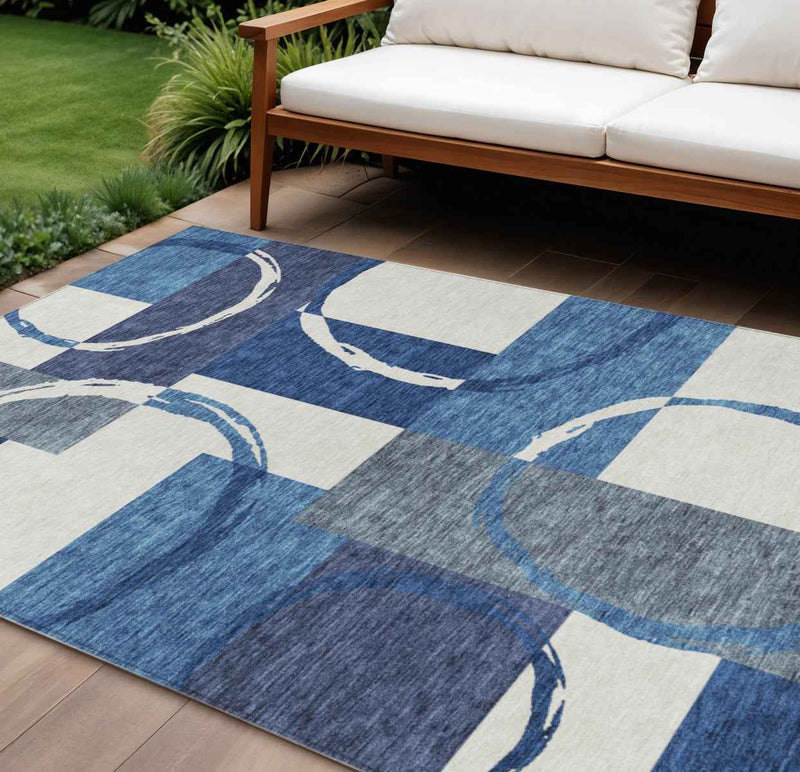 9' X 12' Blue And Ivory Geometric Washable Indoor Outdoor Area Rug