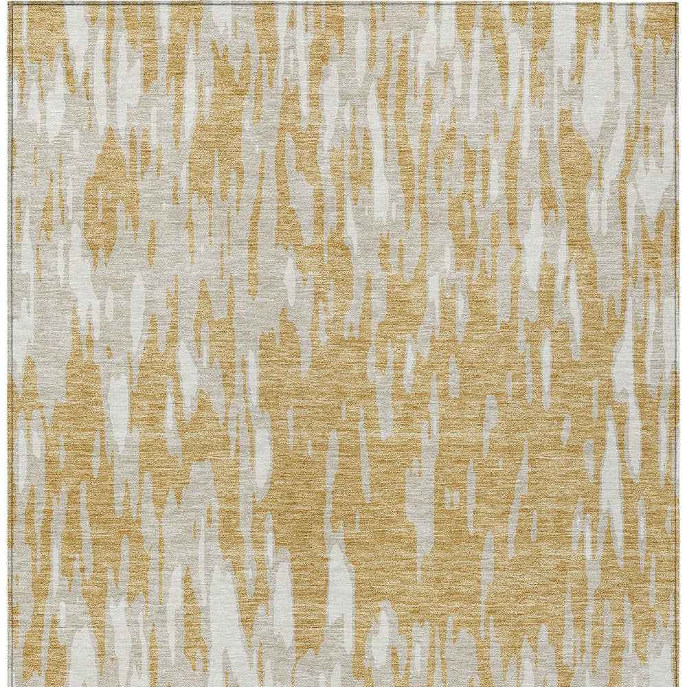 9' X 12' Gold And Ivory Abstract Washable Indoor Outdoor Area Rug