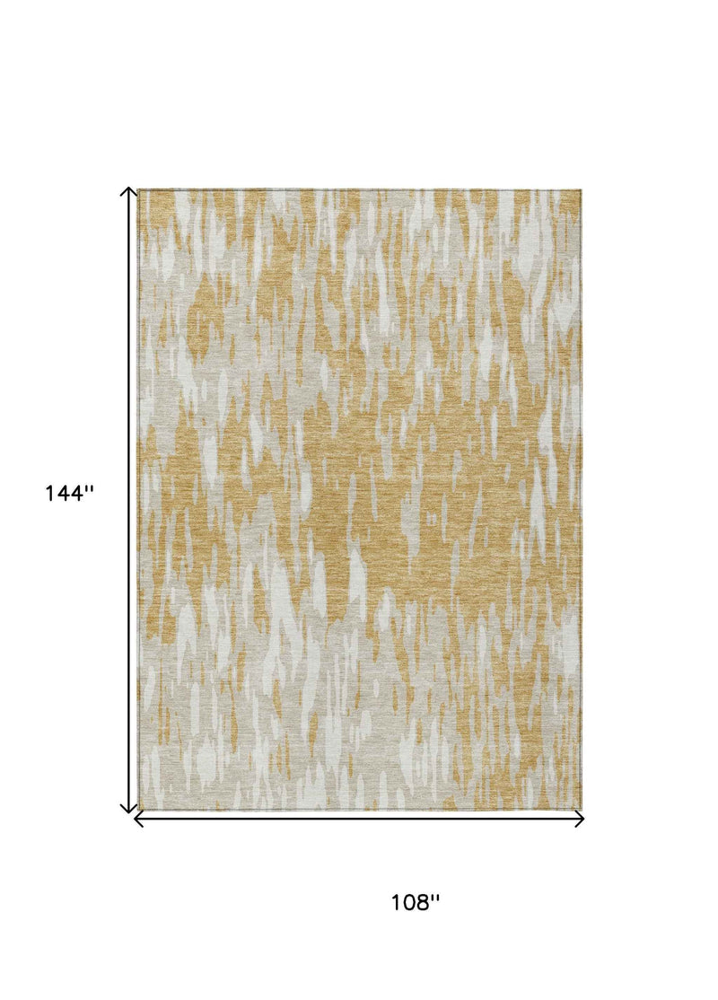 9' X 12' Gold And Ivory Abstract Washable Indoor Outdoor Area Rug