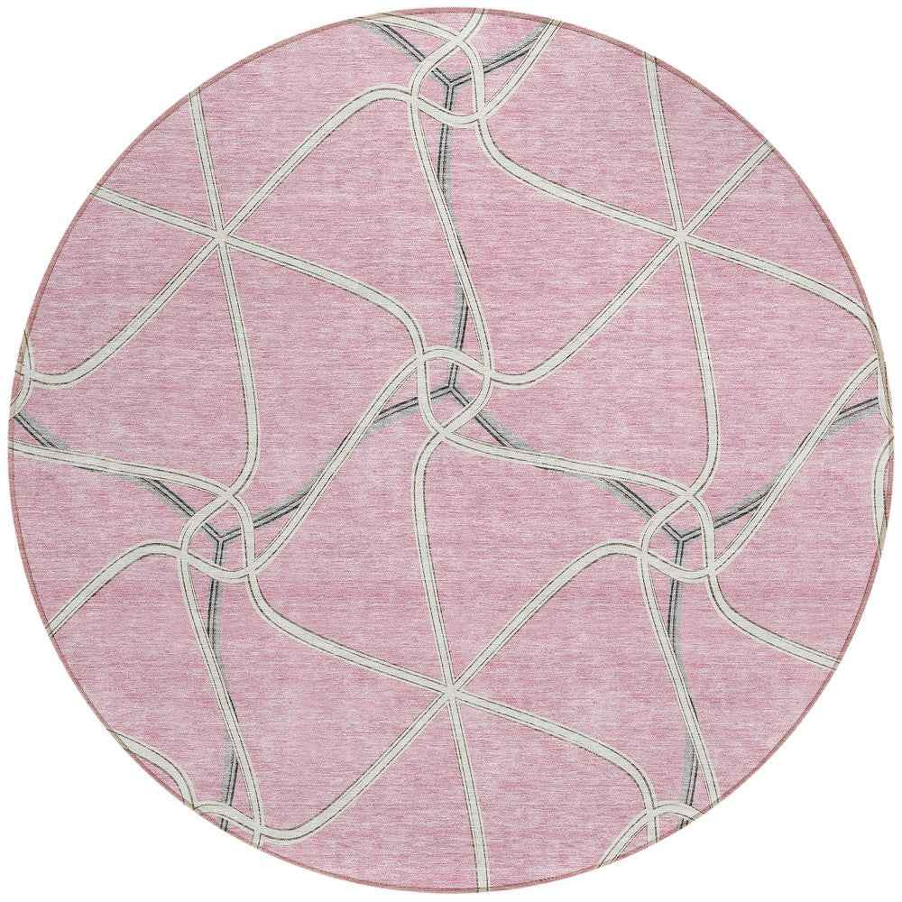 8' Pink And Ivory Round Geometric Washable Indoor Outdoor Area Rug