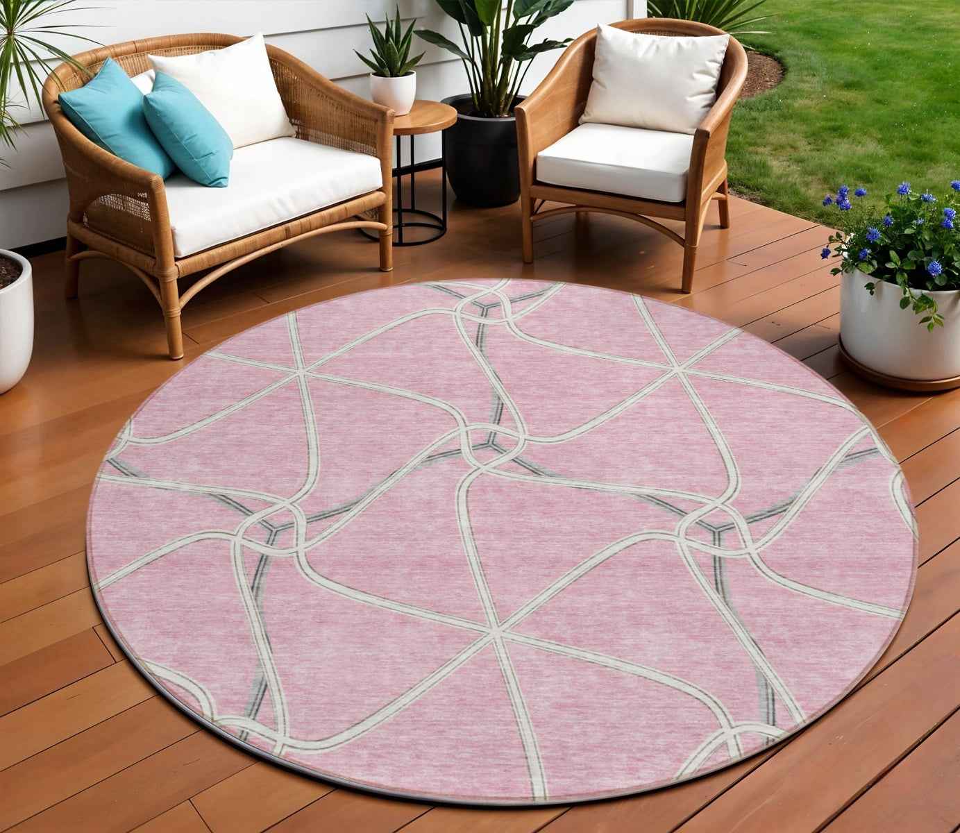 8' Pink And Ivory Round Geometric Washable Indoor Outdoor Area Rug