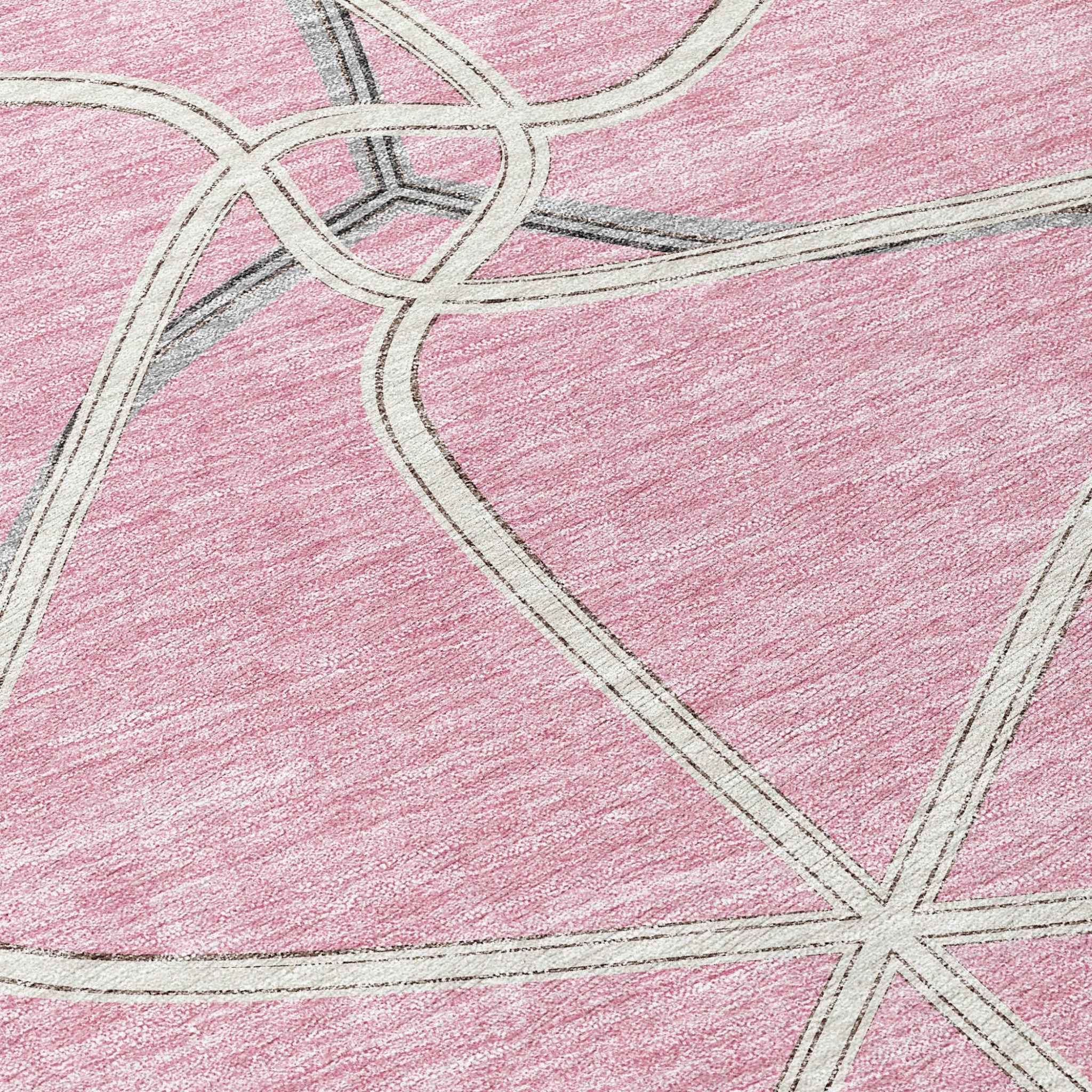 8' Pink And Ivory Round Geometric Washable Indoor Outdoor Area Rug