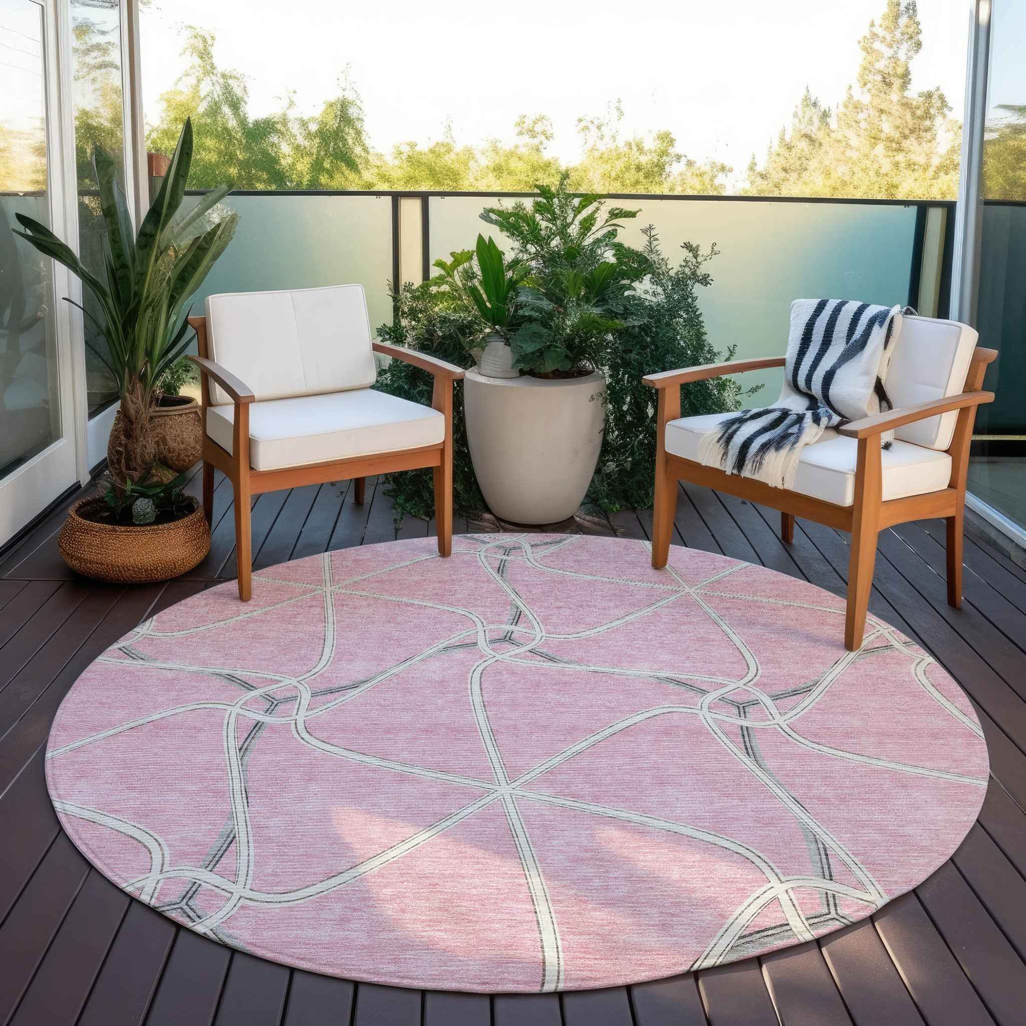 8' Pink And Ivory Round Geometric Washable Indoor Outdoor Area Rug