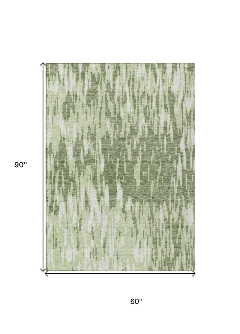 5' X 8' Green And Ivory Abstract Washable Indoor Outdoor Area Rug