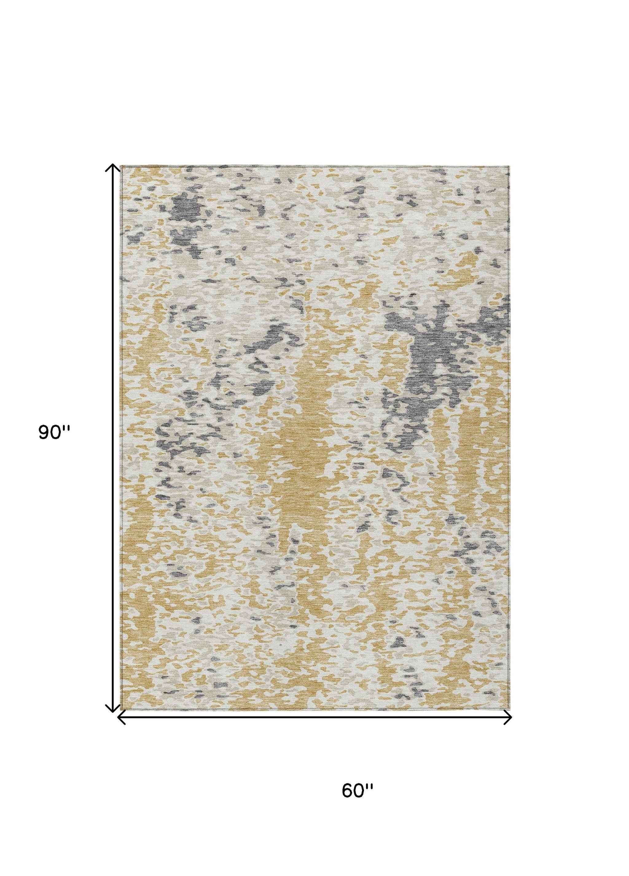 5' X 8' Gold And Ivory Abstract Washable Indoor Outdoor Area Rug