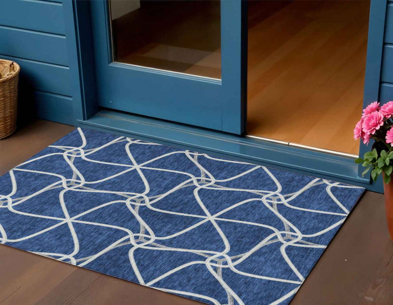 3' X 5' Blue And Ivory Geometric Washable Indoor Outdoor Area Rug
