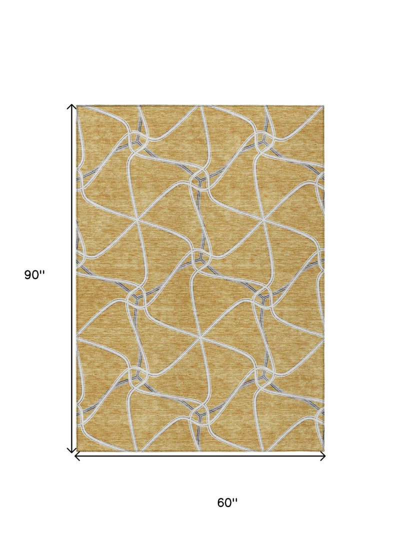 5' X 8' Gold And Ivory Geometric Washable Indoor Outdoor Area Rug