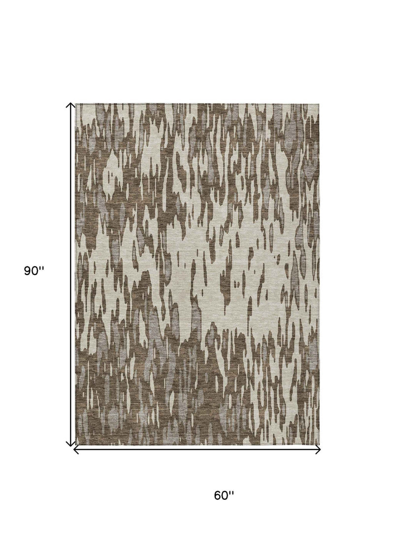 5' X 8' Brown And Ivory Abstract Washable Indoor Outdoor Area Rug