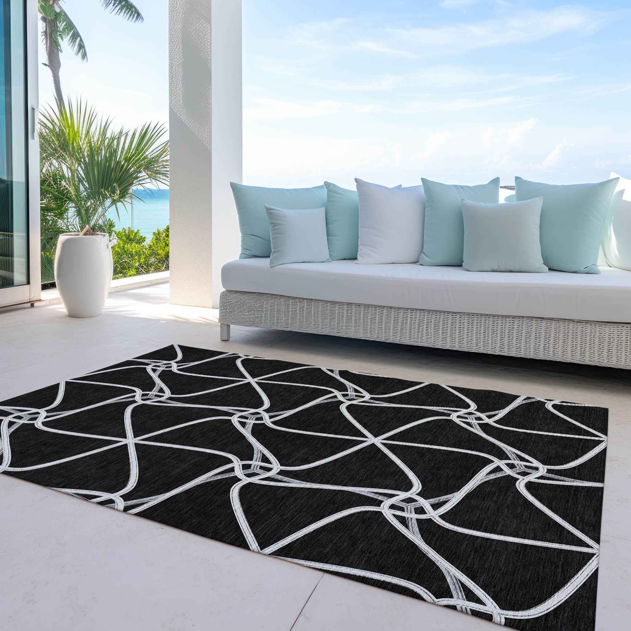 10' X 14' Black And Ivory Geometric Washable Indoor Outdoor Area Rug