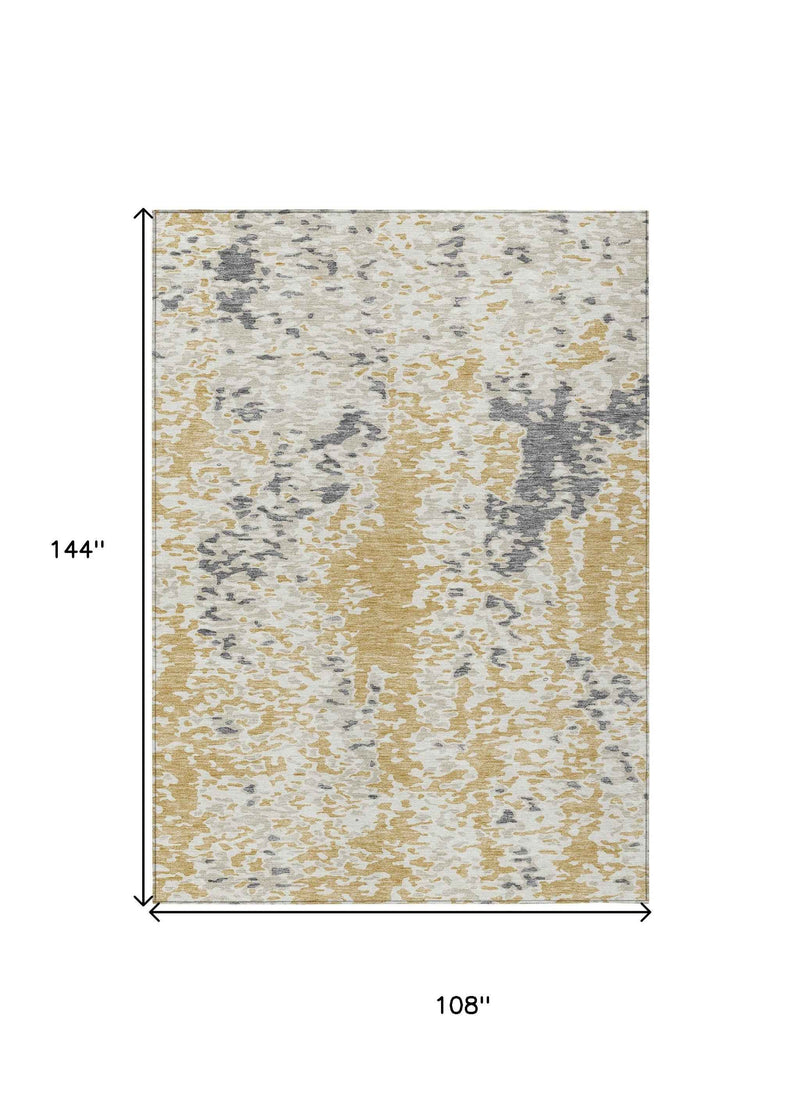 9' X 12' Gold And Ivory Abstract Washable Indoor Outdoor Area Rug