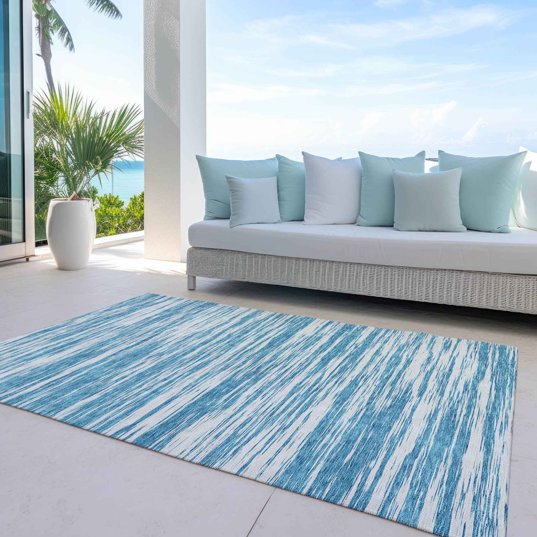 5' X 8' Teal Blue And Ivory Abstract Washable Indoor Outdoor Area Rug