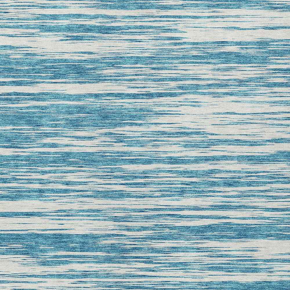 5' X 8' Teal Blue And Ivory Abstract Washable Indoor Outdoor Area Rug