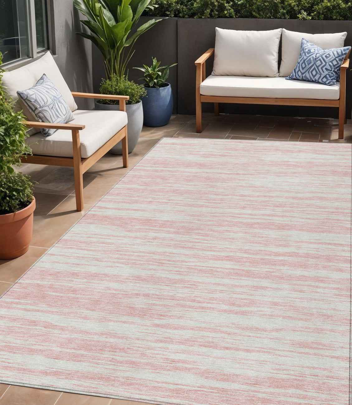 5' X 8' Pink And Ivory Abstract Washable Indoor Outdoor Area Rug
