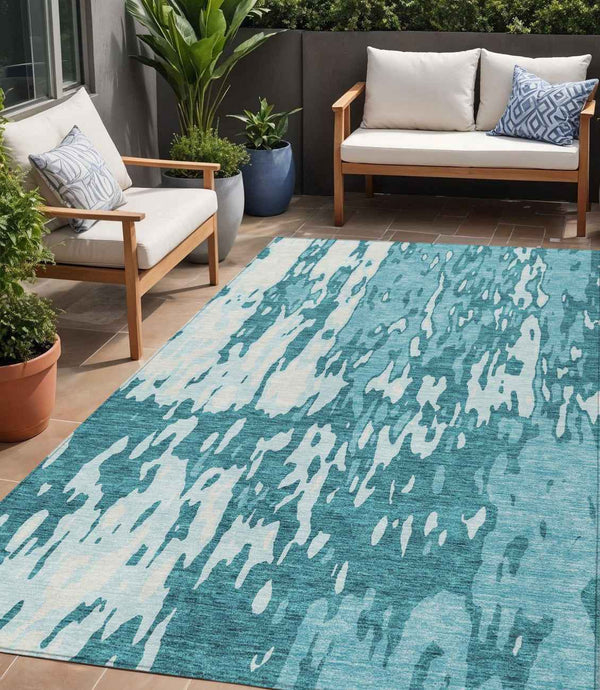 5' X 8' Teal Blue And Ivory Abstract Washable Indoor Outdoor Area Rug