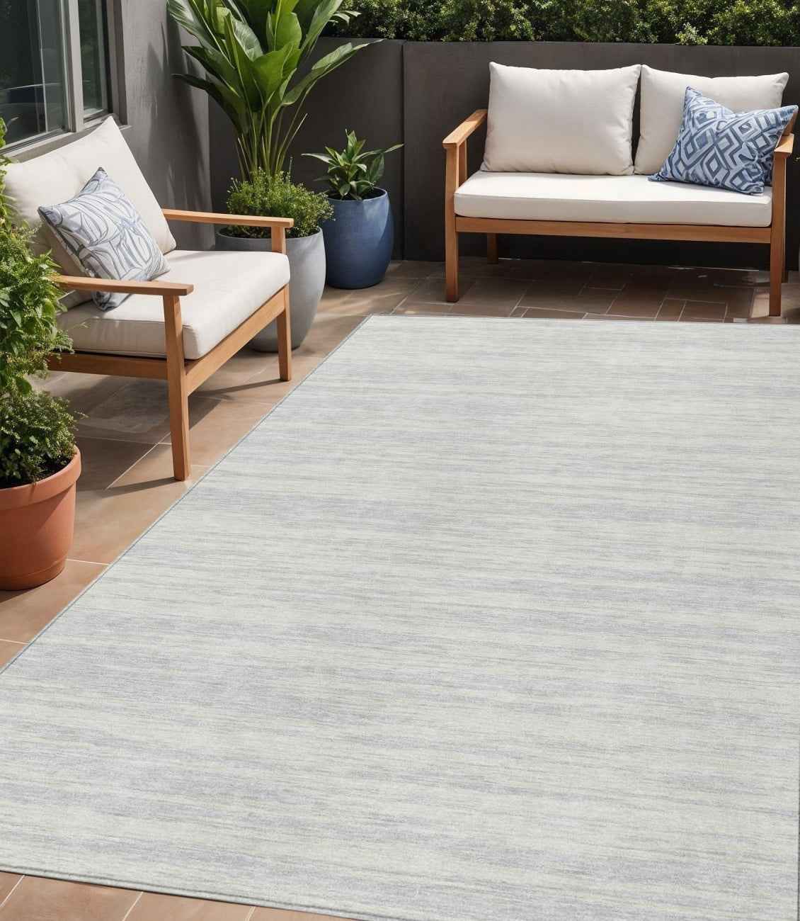 5' X 8' Silver And Ivory Abstract Washable Indoor Outdoor Area Rug