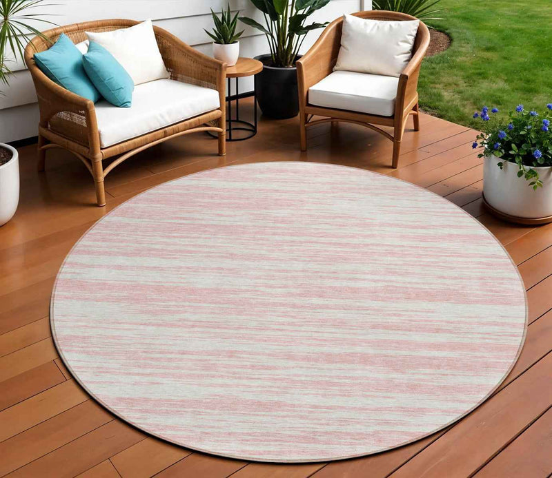 8' Pink And Ivory Round Abstract Washable Indoor Outdoor Area Rug
