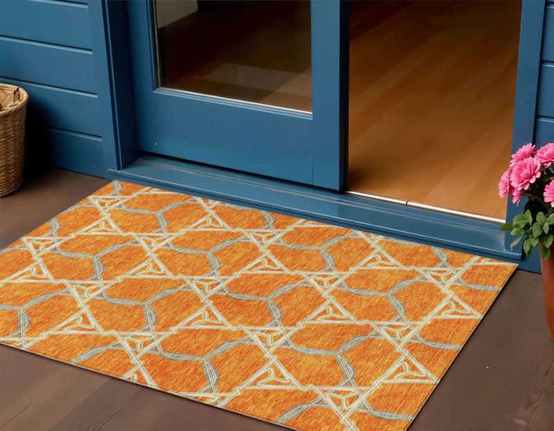 5' X 8' Orange And Blue Geometric Washable Indoor Outdoor Area Rug