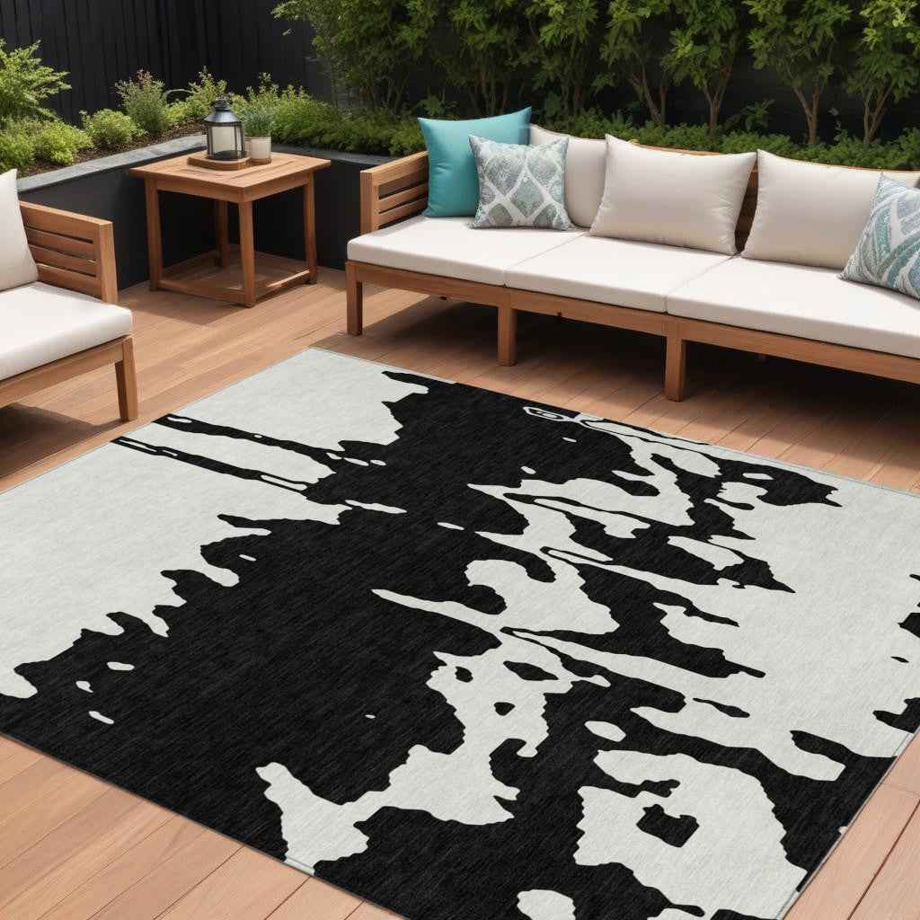 9' X 12' Black And Ivory Abstract Washable Indoor Outdoor Area Rug