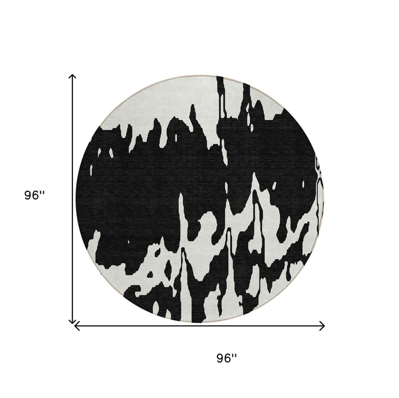 8' Black And Ivory Round Abstract Washable Indoor Outdoor Area Rug