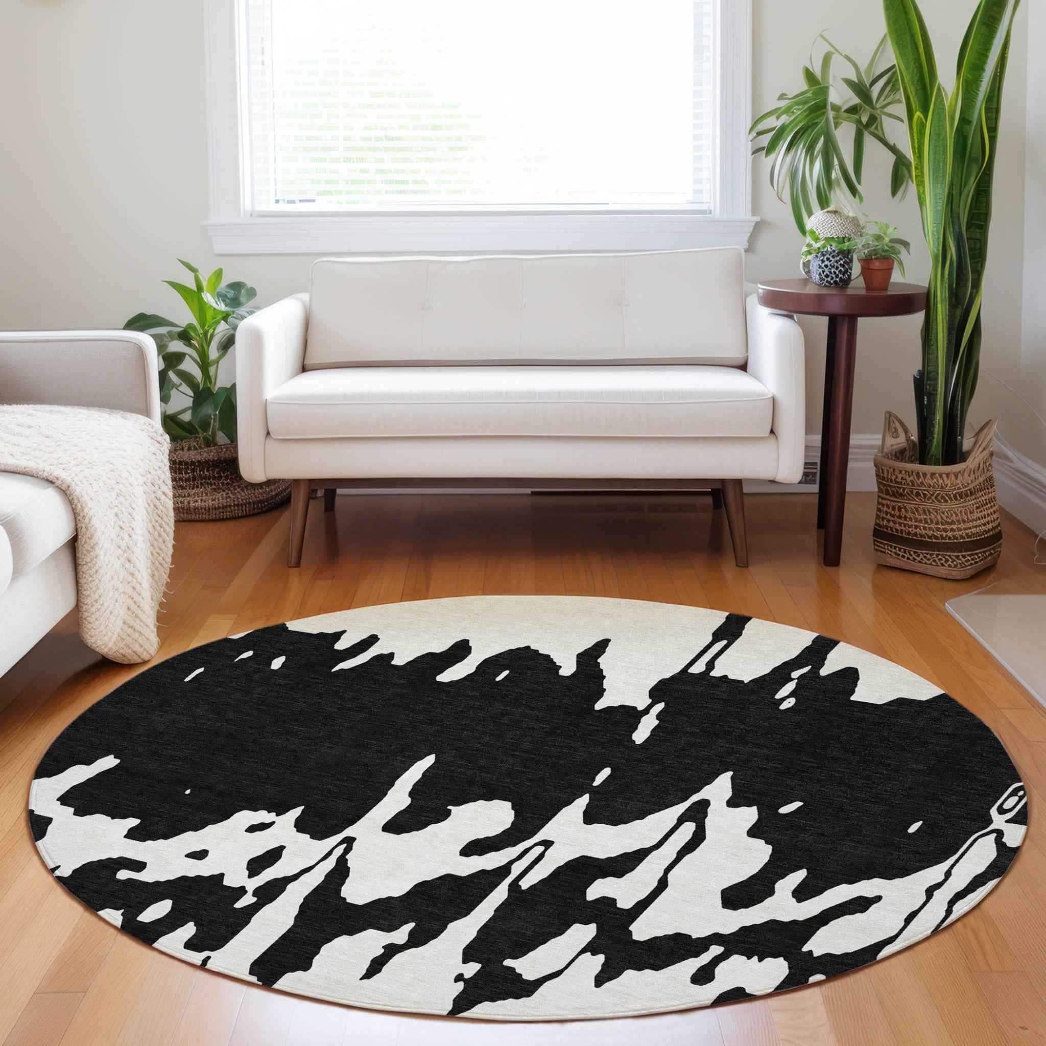 8' Black And Ivory Round Abstract Washable Indoor Outdoor Area Rug