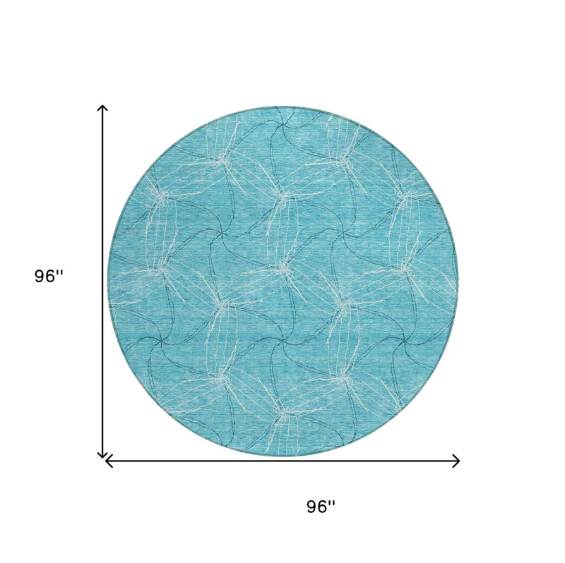 8' Aqua And Ivory Round Geometric Washable Indoor Outdoor Area Rug
