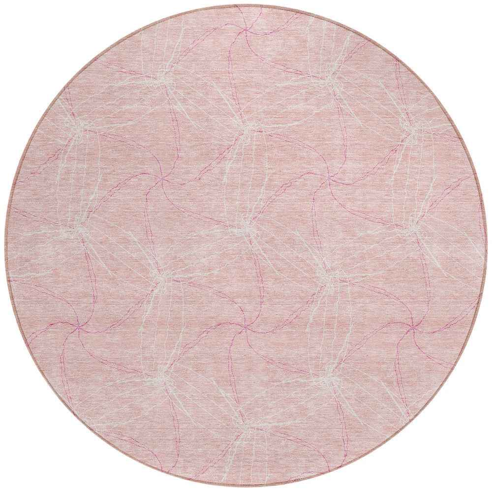 8' Pink And Ivory Round Geometric Washable Indoor Outdoor Area Rug