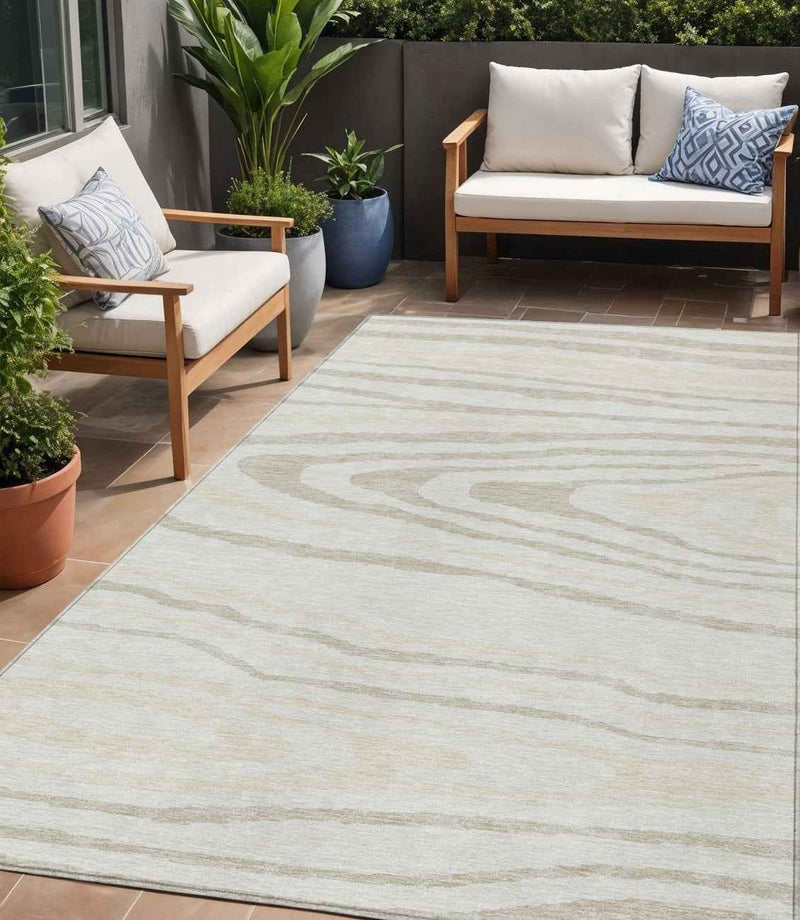 5' X 8' Ivory Beige And Taupe Faux Bois Washable Indoor Outdoor Area Rug