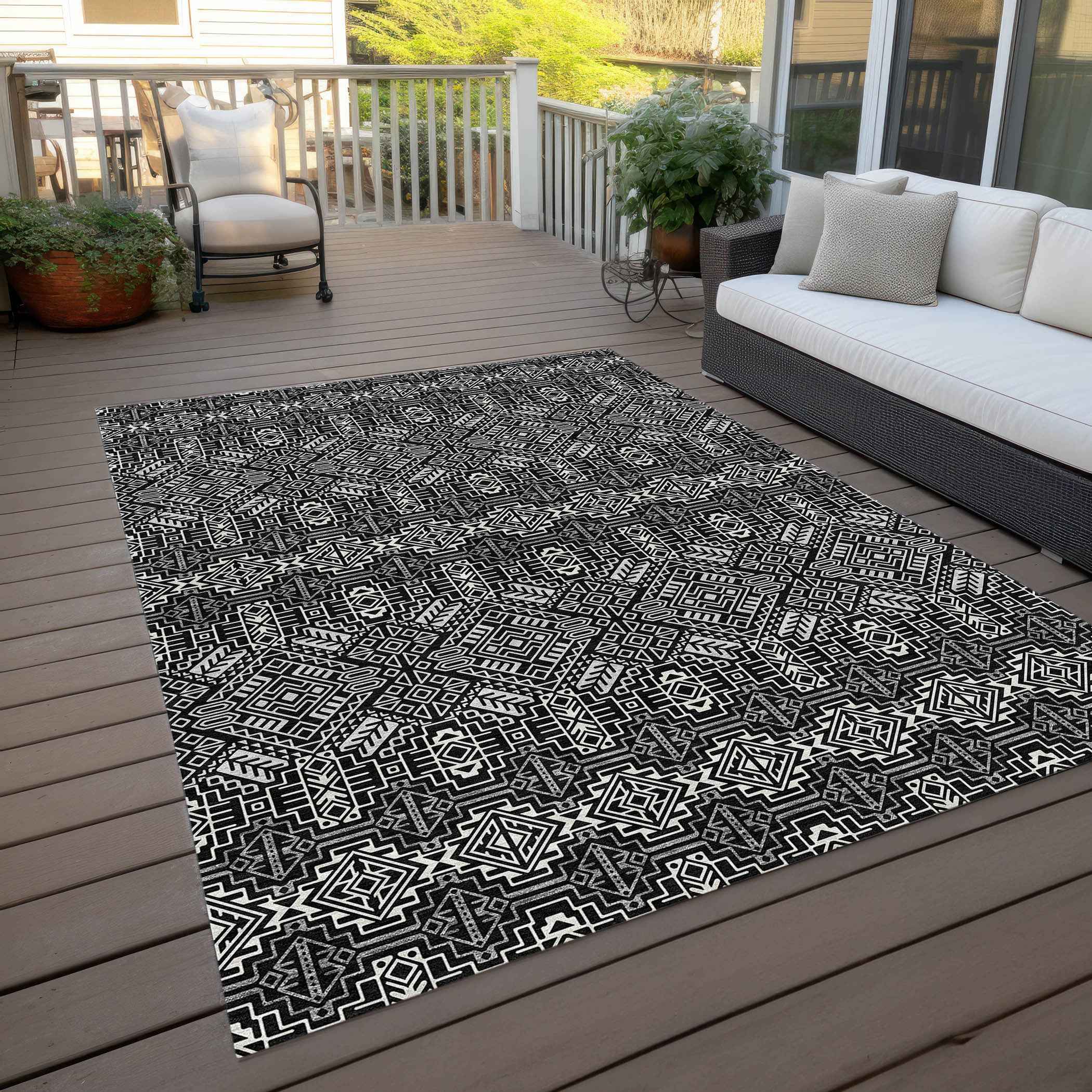 5' X 8' Black And Ivory Tribal Washable Indoor Outdoor Area Rug