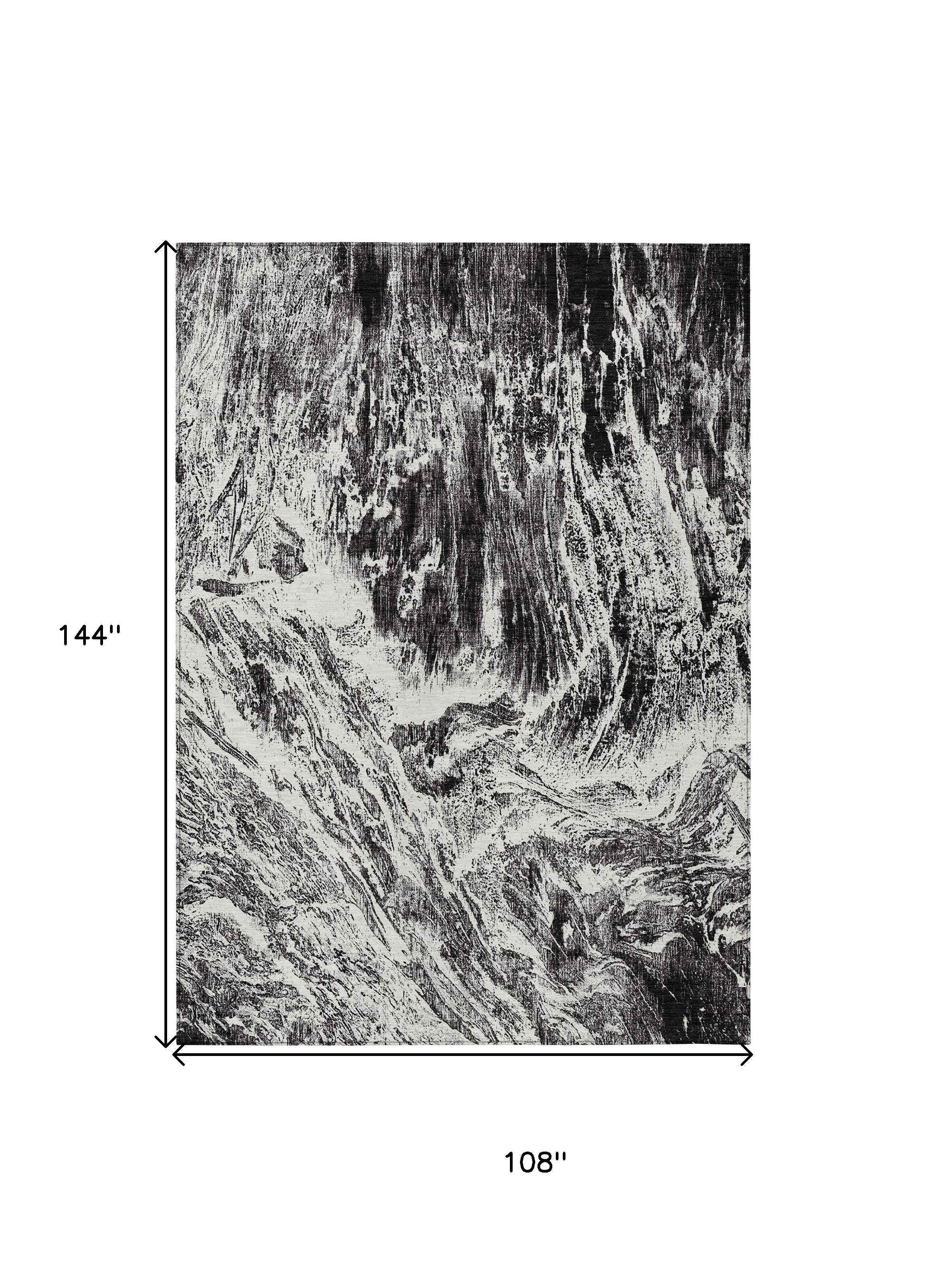 9' X 12' Black And Ivory Abstract Washable Indoor Outdoor Area Rug