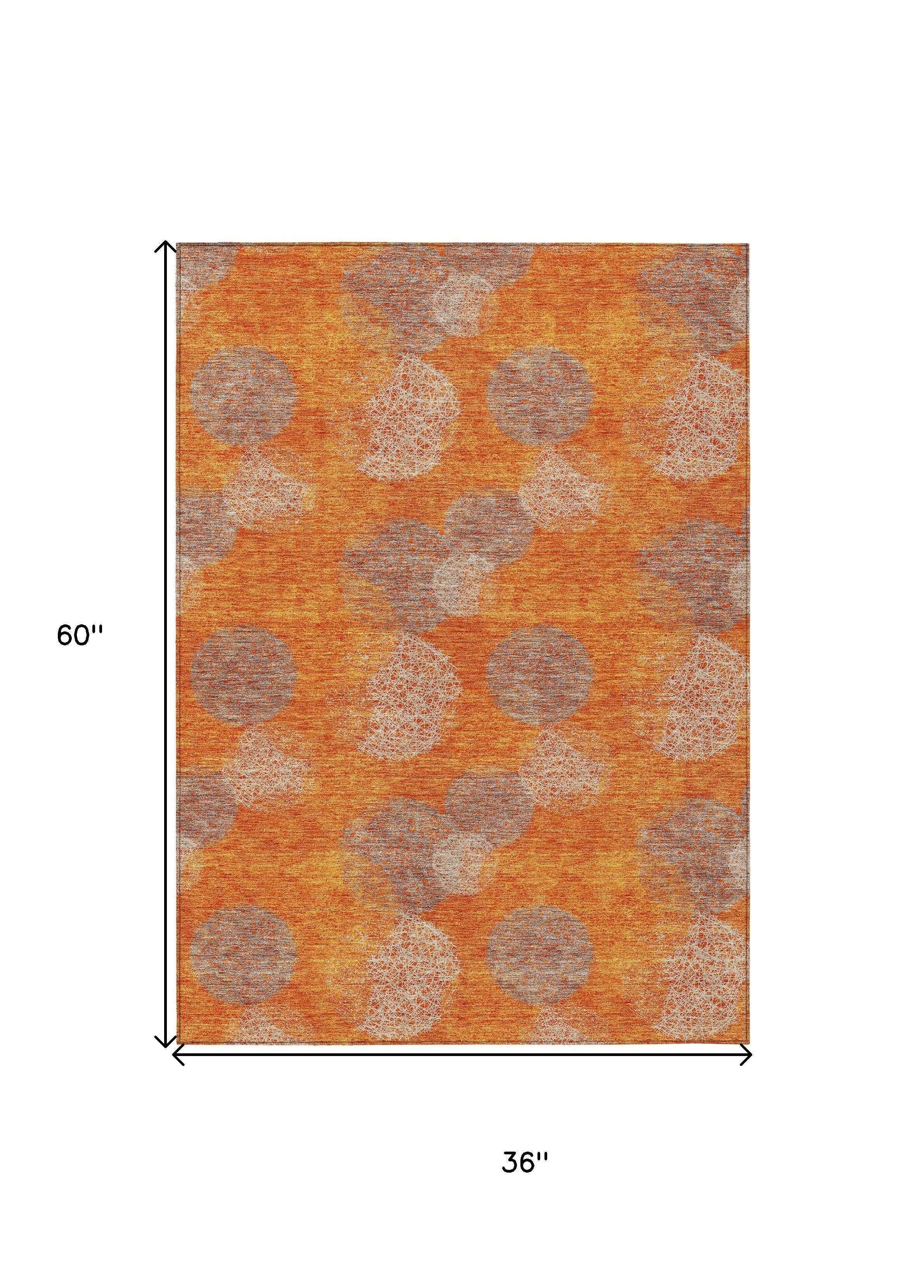 3' X 5' Orange Silver And Peach Polka Dot Washable Indoor Outdoor Area Rug
