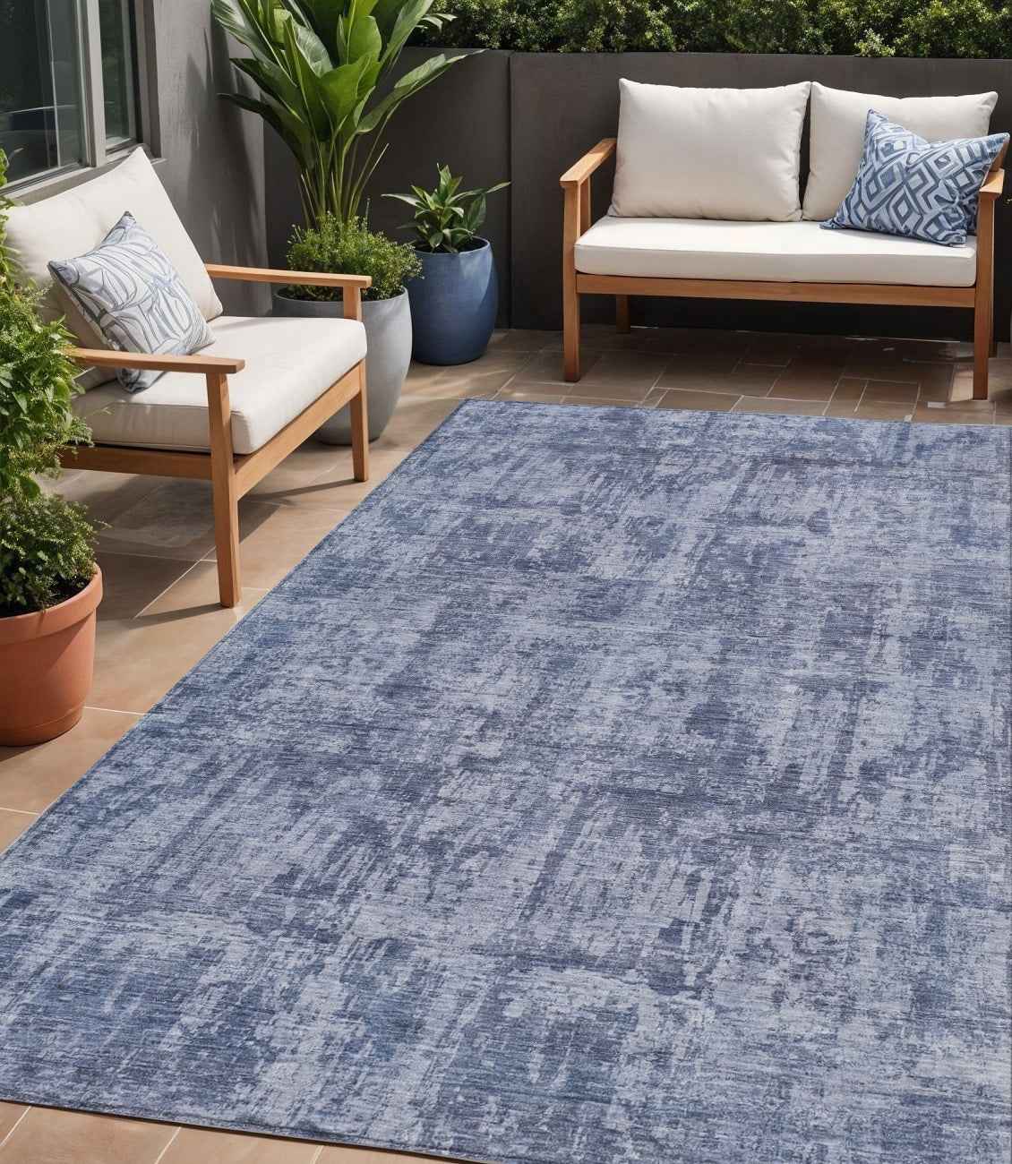5' X 8' Blue And Ivory Abstract Washable Indoor Outdoor Area Rug